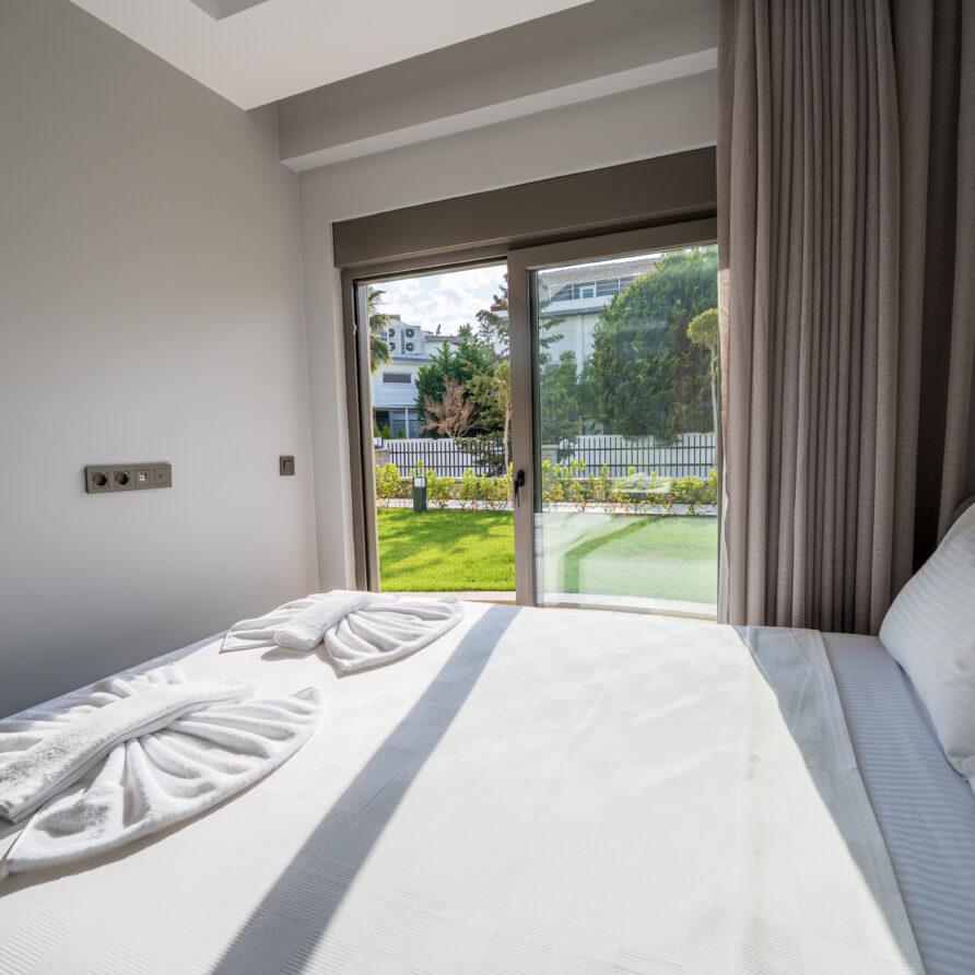 Cozy bedroom of 1+1 Garden View Suite at Holicas Villas